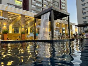Foto da galeria de Evian Thermas Hotel Incrível no Centro de Caldas Novas com Águas Termais e Ingressos com Valores Exclusivos no Hot Park, Lagoa Termas, Náutico e WaterPark em Caldas Novas