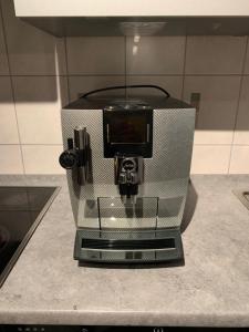 a coffee maker sitting on top of a counter at Ferienwohnung am Süd-Schwarzwald 1 in Murg