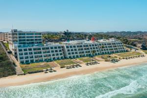 an aerial view of a resort on the beach at Iberostar Selection Playa Mita in Punta Mita