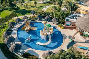 an empty pool at a resort with a water park at Iberostar Selection Playa Mita in Punta Mita