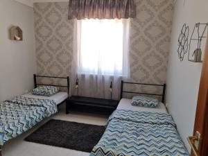 A bed or beds in a room at Come.in