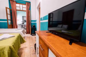 TV a/nebo společenská místnost v ubytování Casa Veeyuu
