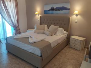 Letto o letti in una camera di Villa Soula Kaliva