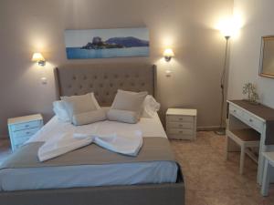 Letto o letti in una camera di Villa Soula Kaliva