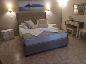 Letto o letti in una camera di Villa Soula Kaliva