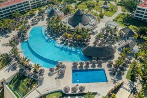 an aerial view of a resort swimming pool at Iberostar Selection Playa Mita in Punta Mita
