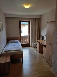 Ein Bett oder Betten in einem Zimmer der Unterkunft Wei Wei's Hostel