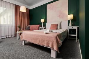 Posteľ alebo postele v izbe v ubytovaní Hotel Prowincja