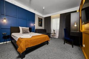 Posteľ alebo postele v izbe v ubytovaní Hotel Prowincja