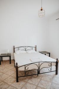 Posteľ alebo postele v izbe v ubytovaní Kyriaki House