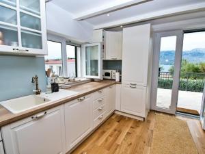 Kuchyň nebo kuchyňský kout v ubytování Beach House Calendula