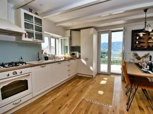Kuchyň nebo kuchyňský kout v ubytování Beach House Calendula