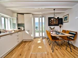 Kuchyň nebo kuchyňský kout v ubytování Beach House Calendula