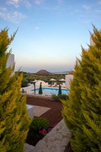 The swimming pool at or close to Cavo Plako Villas