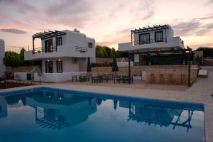 The swimming pool at or close to Cavo Plako Villas