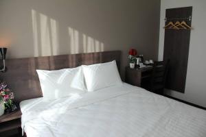 Katil atau katil-katil dalam bilik di KL Hotel