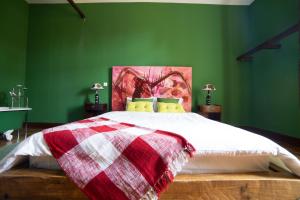 Cama ou camas em um quarto em Santa Maria Hostel