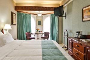 Cama o camas de una habitación en Hotel Plaza Del Libertador