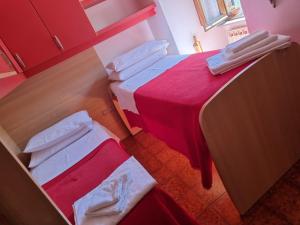 Posteľ alebo postele v izbe v ubytovaní A Casa di Cristina