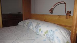 En eller flere senge i et værelse på La Casa de la Vila
