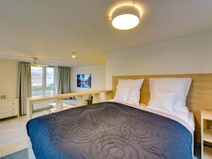 Posteľ alebo postele v izbe v ubytovaní Chrobry Apartamenty Gdańsk Grodzka 10