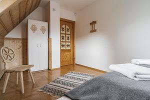 Posteľ alebo postele v izbe v ubytovaní ZAKOHOME- Willa Miła Moja