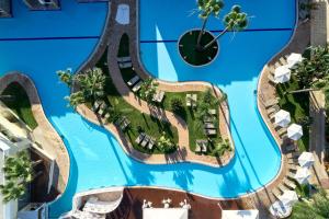 an aerial view of an island in the water at a resort at Atlantica Aeneas Resort in Ayia Napa