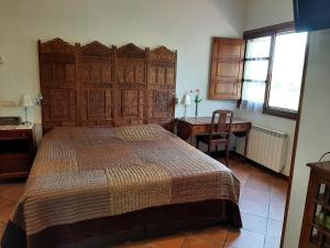 Ένα ή περισσότερα κρεβάτια σε δωμάτιο στο Villa Claudine