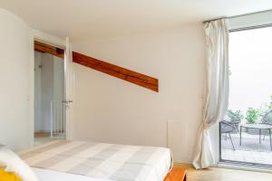 Posteľ alebo postele v izbe v ubytovaní Luxury 350 Sq Mt flat with Terrace central Trieste