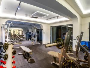a fitness room with treadmills and cardio equipment at TNR Otel & Spa in Kusadası