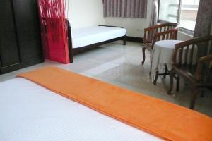 Postel nebo postele na pokoji v ubytování Kuo Kuang Hostel