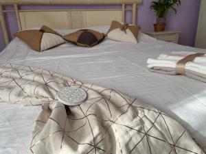 Katil atau katil-katil dalam bilik di Chambre d'hôte