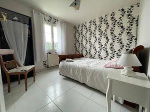 Postel nebo postele na pokoji v ubytování Chambre d'hôte