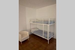 Postel nebo postele na pokoji v ubytování Loft 81, incantevole, ampio, in zona panoramica