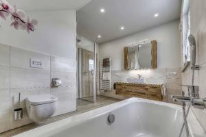 Ένα μπάνιο στο Ferienchalet zum Lusen