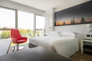 Postel nebo postele na pokoji v ubytování Life Hotel