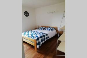 Una cama o camas en una habitación de Gite la Balme