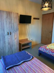Posteľ alebo postele v izbe v ubytovaní Nikol Apartments