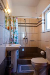 A bathroom at Cavo Plako Villas