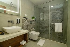 Um banheiro em The Avatar Hotel & Convention