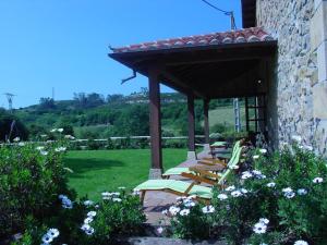 Κήπος έξω από το Posada Rural Valoria +15 φωτογραφίες