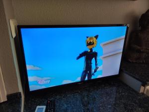 TV a/nebo společenská místnost v ubytování VACACIONES TIERRA Y MAR