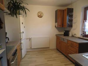 Η κουζίνα ή μικρή κουζίνα στο Ferienhaus Waldblick