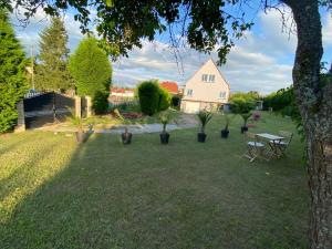 Au paradis d’Alsace 55 m2 nature & relax tesisinin dışında bir bahçe