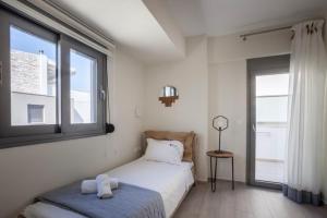 Ένα ή περισσότερα κρεβάτια σε δωμάτιο στο Hanioti suite mezonete 6 people