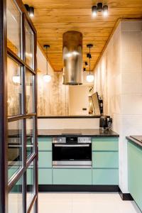 Kuchyňa alebo kuchynka v ubytovaní Apartament Wenecja