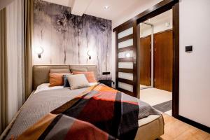 Posteľ alebo postele v izbe v ubytovaní Apartament Wenecja