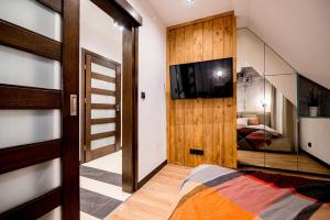 Posteľ alebo postele v izbe v ubytovaní Apartament Wenecja