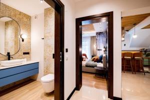 Posteľ alebo postele v izbe v ubytovaní Apartament Wenecja