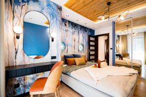 Posteľ alebo postele v izbe v ubytovaní Apartament Wenecja